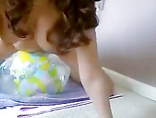 Naked Girl Riding Transparent Earth Beachball