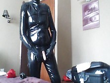 Rubber Catsuit And Masks