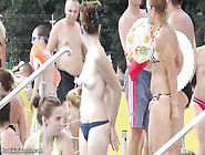 alluring topless 18-year-olds tanning wearing micro thongs