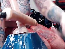 tattooed slut takes fucking machine and gets covered in cum
