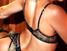 Beautiful lesbians in black lingerie playing with toys