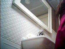 Toilet voyeur sexy brunette