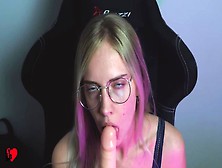 Beautiful Bitch In Glasses Sucking Dildo