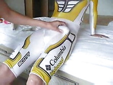 guy gets wanked in latex sports-trousers