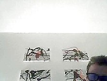 masked golden-haired on web camera