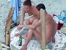 Pretty Brunette Sucks Her Man's Dick On A Beach In Hardcore Clip