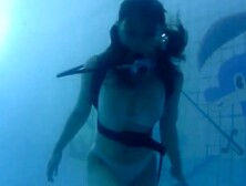 Scuba Girl Showing Off Her Body In The Water