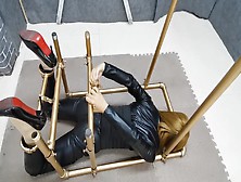 Catsuit Asian In Metal Bondage