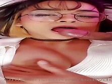 Honey with glasses is doing wild stuff in front of the camera, late at night