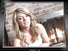 Sexy blonde dripping wet as she soaks her shirt