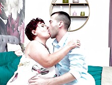 Redhead Elmira V.  enjoys while giving a good blowjob to her man