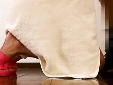 Milf gets home delivery and gets on his knees to suck the guy's dick.