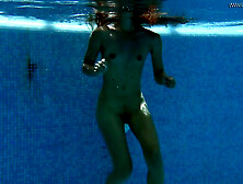 Irina Strips Naked In The Swimming Pool