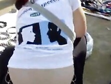 Busty girl showing butt crack on candid spy cam