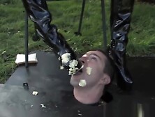 Busty bdsm femdoms sub eats food of her boots