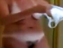Tanned milf in shower