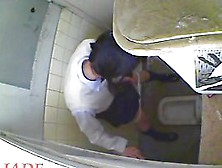 A horny Asian chick masturbating in the college toilet