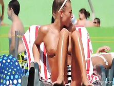 Sexy Topless Babes Tanning At The Pool