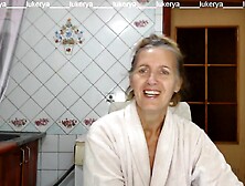 Hawt hostess Lukerya in the kitchen in a dressing gown.