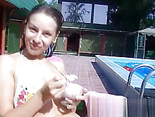 Young Girl Playing In Pool