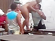 Naked latina gets her pussy eaten out by a fat guy on a table in a bar