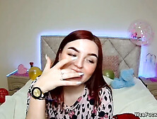 Red-haired cam girl performs solo show for her fans
