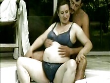 Pregnant couple in pool get horny. Amateur Preggo whale gets fuced hard in her face