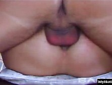 Brunette British dirty girl,  McKenzie Lee,  wearing some sexy lingerie and fishnet stockings,