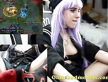 Sexy gamer playing League of Legends with toy in her cunt