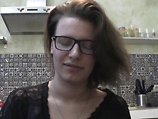 Solo Girl With Glasses Chatting In The Kitchen