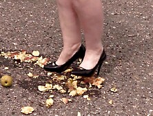 Crush fetish outdoors Obese legs in high heel shoes crush apples