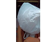 Girl Breathplay With Plastic Bag And Wearing Socks