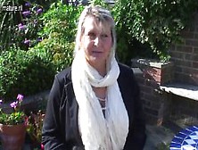 Big breasted amateur granny masturbate in the garden