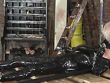 Mason Madison wrapped in black foil and gets his dick stroked