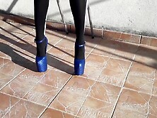 Denim shorts,  ebony tights and marvelous 8 inch heels