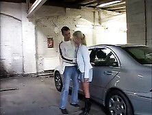 Sexy German teacher fucks secretly in a college parking lot in Berlin