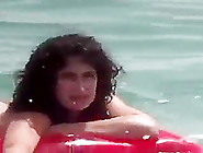 Nude junior woman on the beach