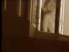 Man kissing the naked lover on window movie