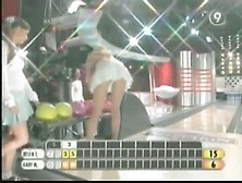 Hot blonde TV presenter in upskirt (fake) action.