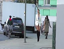 Woman on the street in without panties.  Sexy bottomless chick
