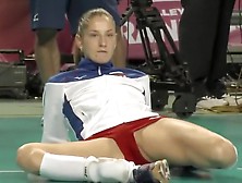Pro sport babe stretches on the floor