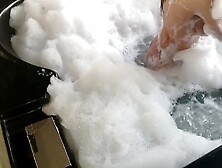 Brunette Washes Her Big Tits In Hydromassage