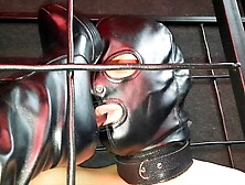 Caged Slave Licks Dominatrix’ Boots