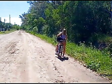 Trailer.  Cyclists have sex near the highway,  outdoors.  Rural cycle tourism and sex