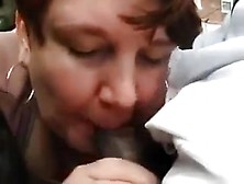 chubby mature sucks big black cock in car