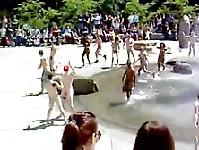 naked UNI students around the fountain