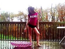 teen dancin in the rain