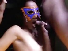Mixed Asian babe wearing a mask gets fucked deep against the wall and sucks white dick