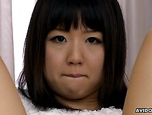 Asian solo chick Tomomi Nakama masturbating naked uncensored.