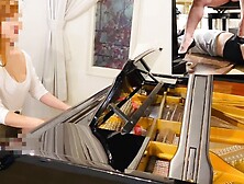 Playing The Piano And Teasing The M-man With Heels In A Rear Seated Position